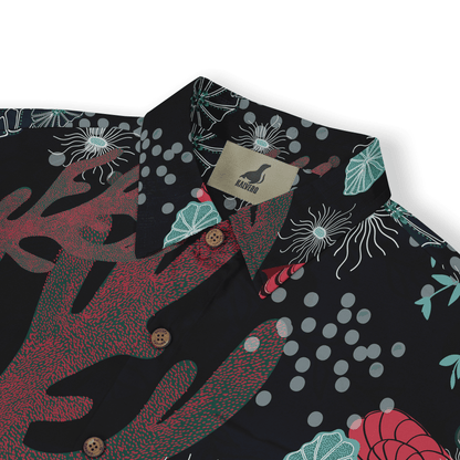 Black shirt with vibrant floral and leaf patterns, featuring wooden.