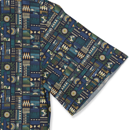 A short-sleeved shirt with an intricate geometric pattern in deep blues, greens, and golds. sleeve close-up