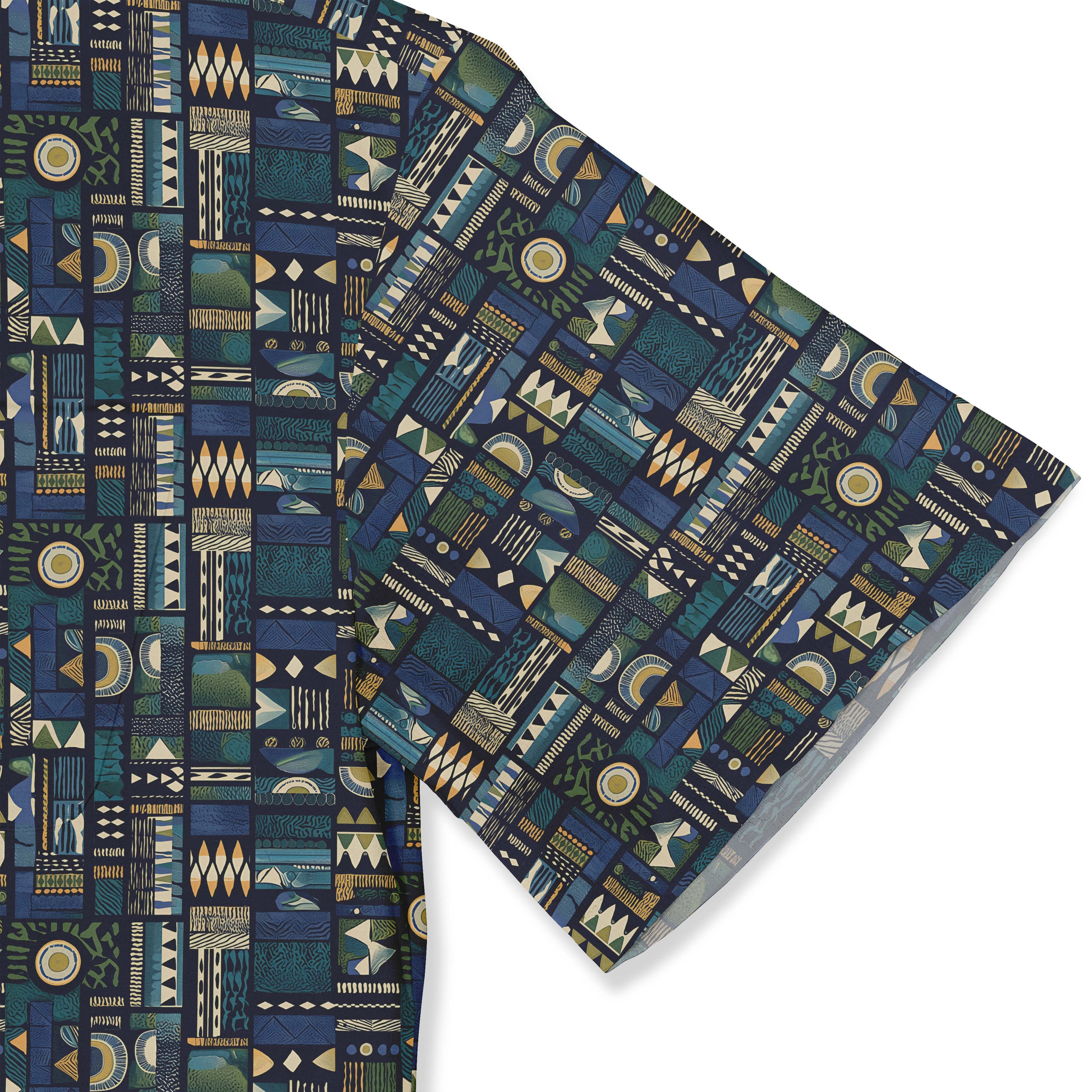 Blue fabric with geometric patterns in green, white, and gold.