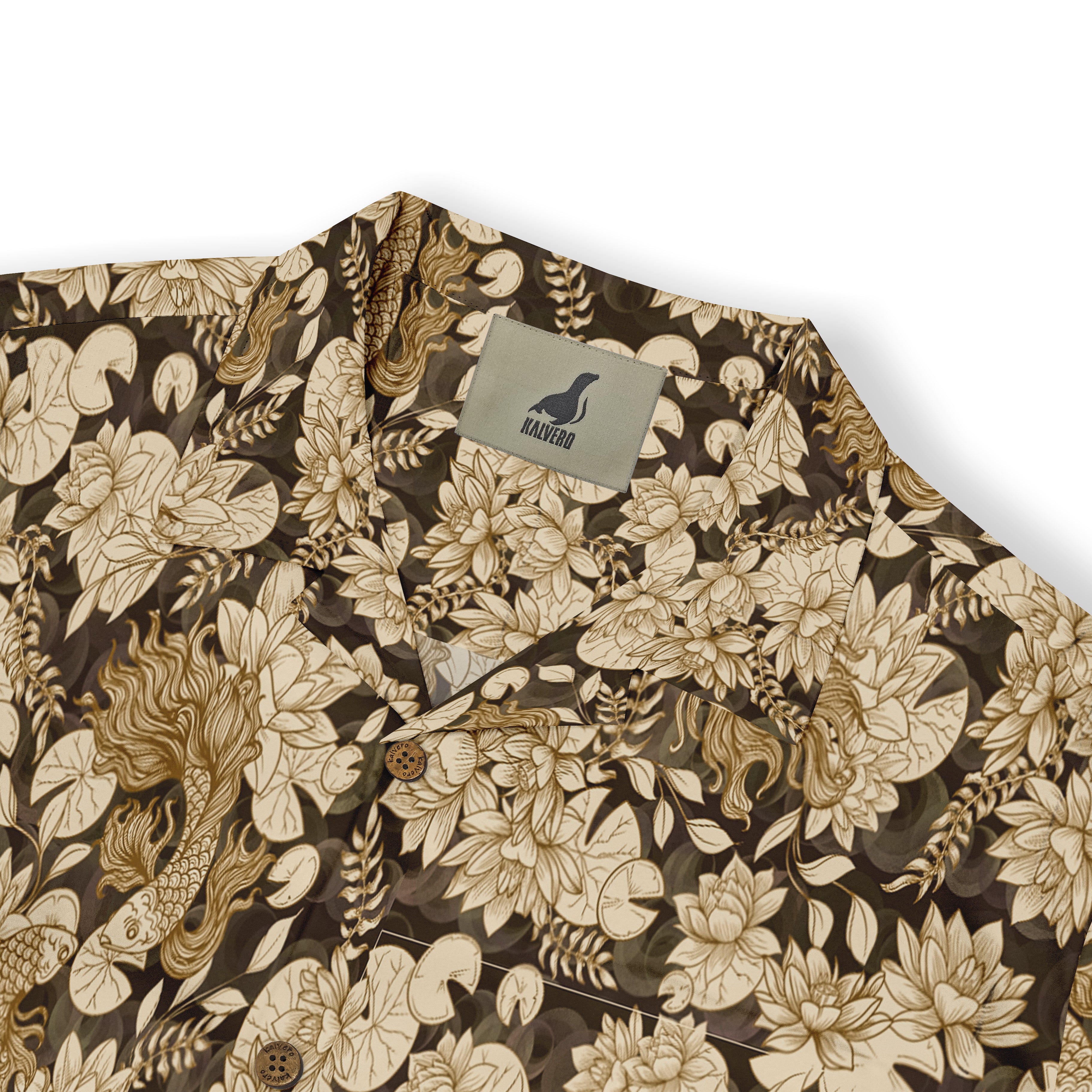 Close-up view of a Hawaiian shirt with intricate beige floral and aquatic-themed patterns on a dark background, highlighting the Kalvero brand label on the collar.