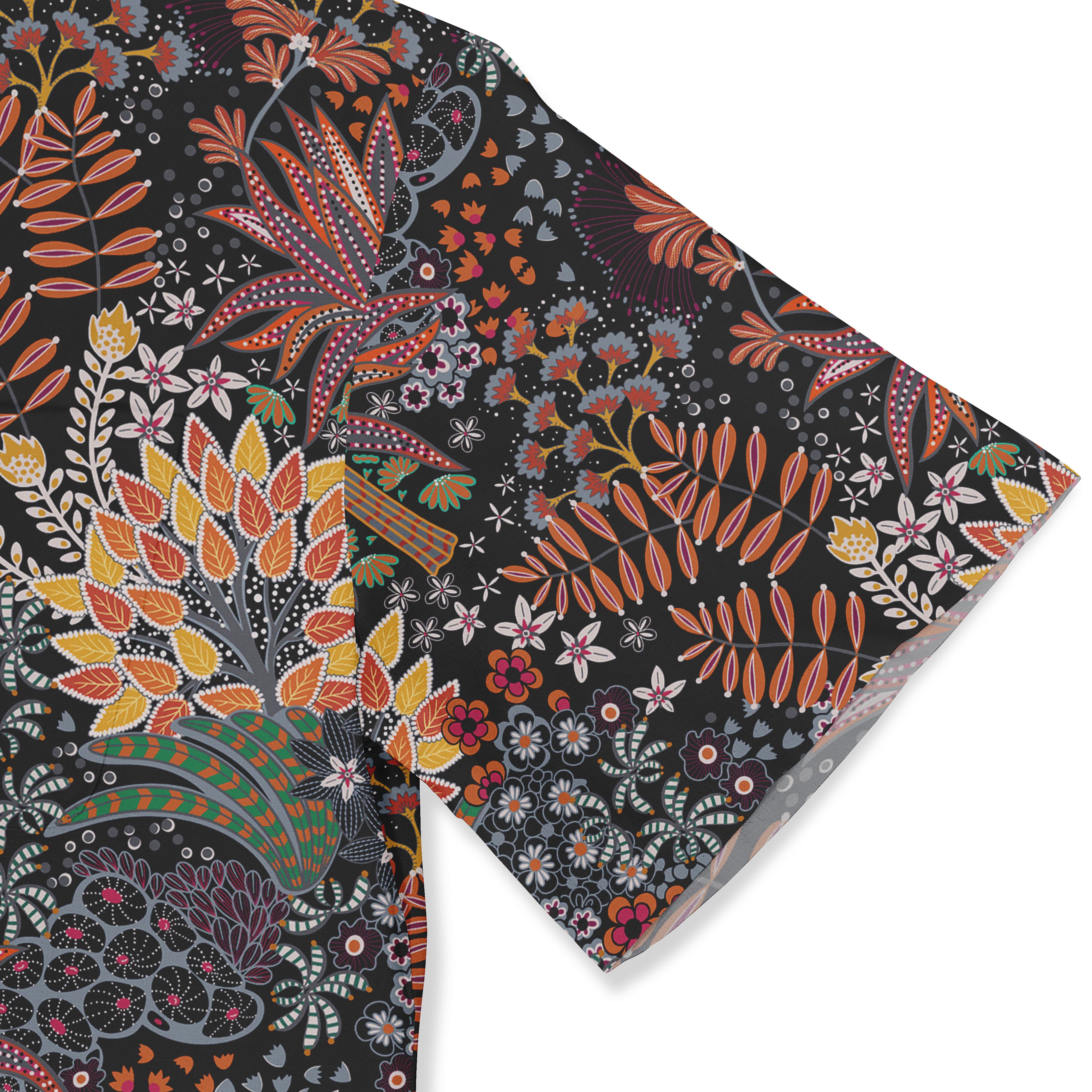 A shirt sleeve with a colorful floral design, featuring a variety of flowers and leaves in orange, red, yellow, and green on a dark background.