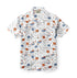 White shirt with blue boats, orange stars, hearts, and seagulls.