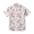 White shirt with pink floral pattern and small figures.