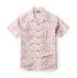 White short-sleeve shirt with pink geometric patterns and buttons.