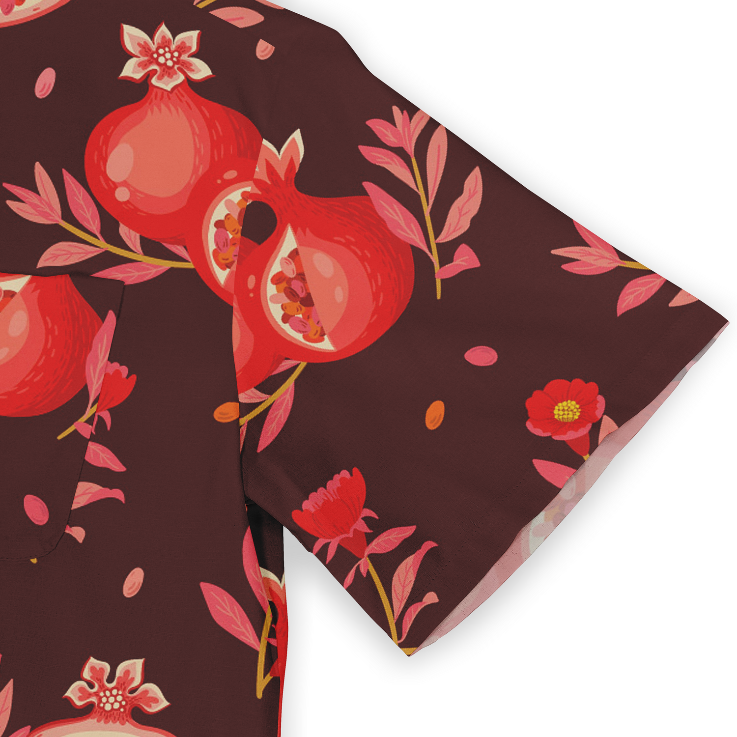 Close-up of a Hawaiian shirt sleeve with a pomegranate and floral pattern in red and pink tones on a deep burgundy background.