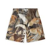 Pair of shorts featuring a jungle-inspired design with muted earthy tones, showcasing palm leaves and a subtle silhouette of a panther.