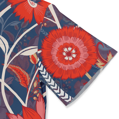 This is a close-up of a Hawaiian shirt sleeve with a bold floral pattern in red, pink, and purple. The design includes large flowers and leaves, creating a vibrant tropical look.