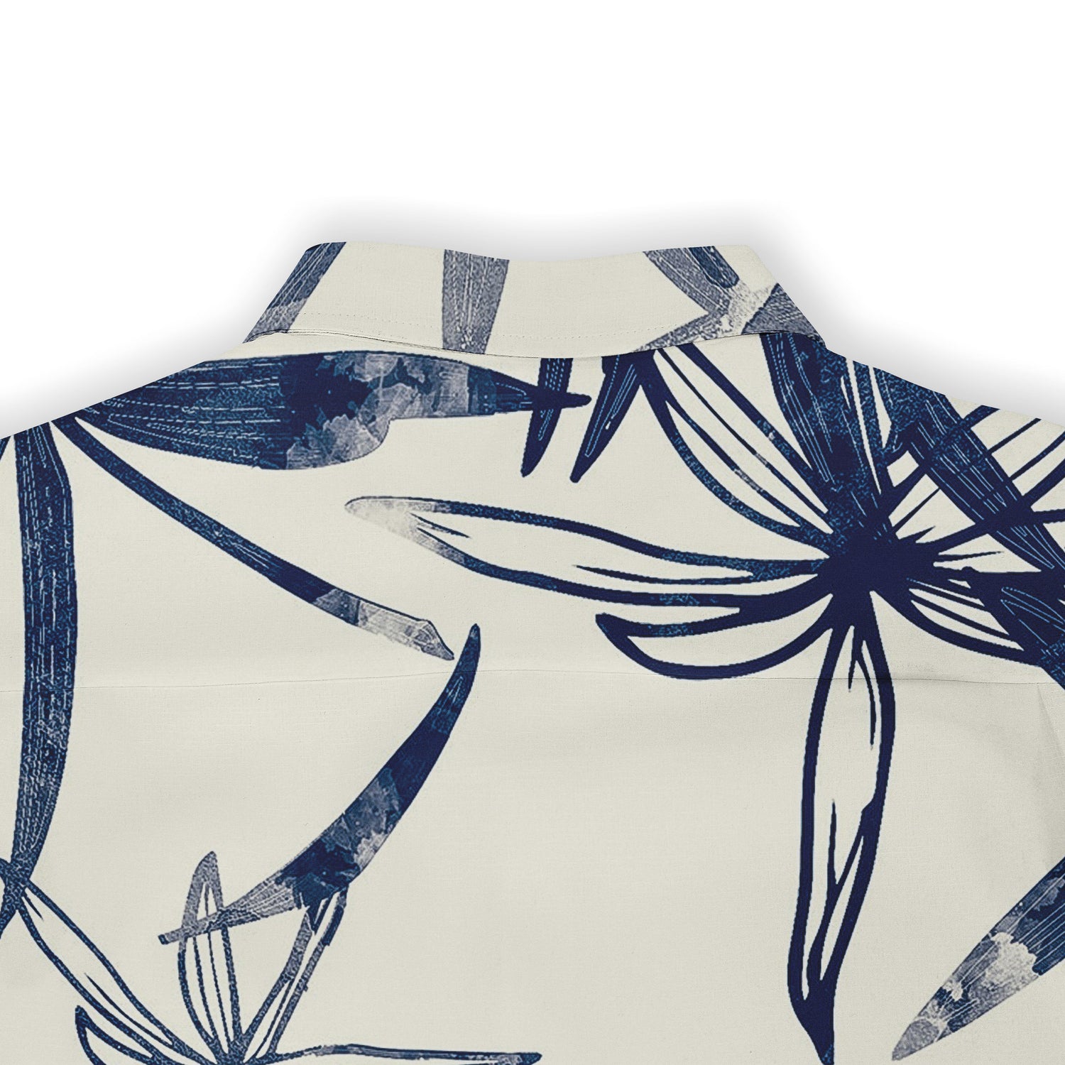 A close-up view of the back collar area of a shirt, featuring an abstract floral design in dark blue on a white background. The fabric showcases a textured look, emphasizing the unique pattern and modern style.