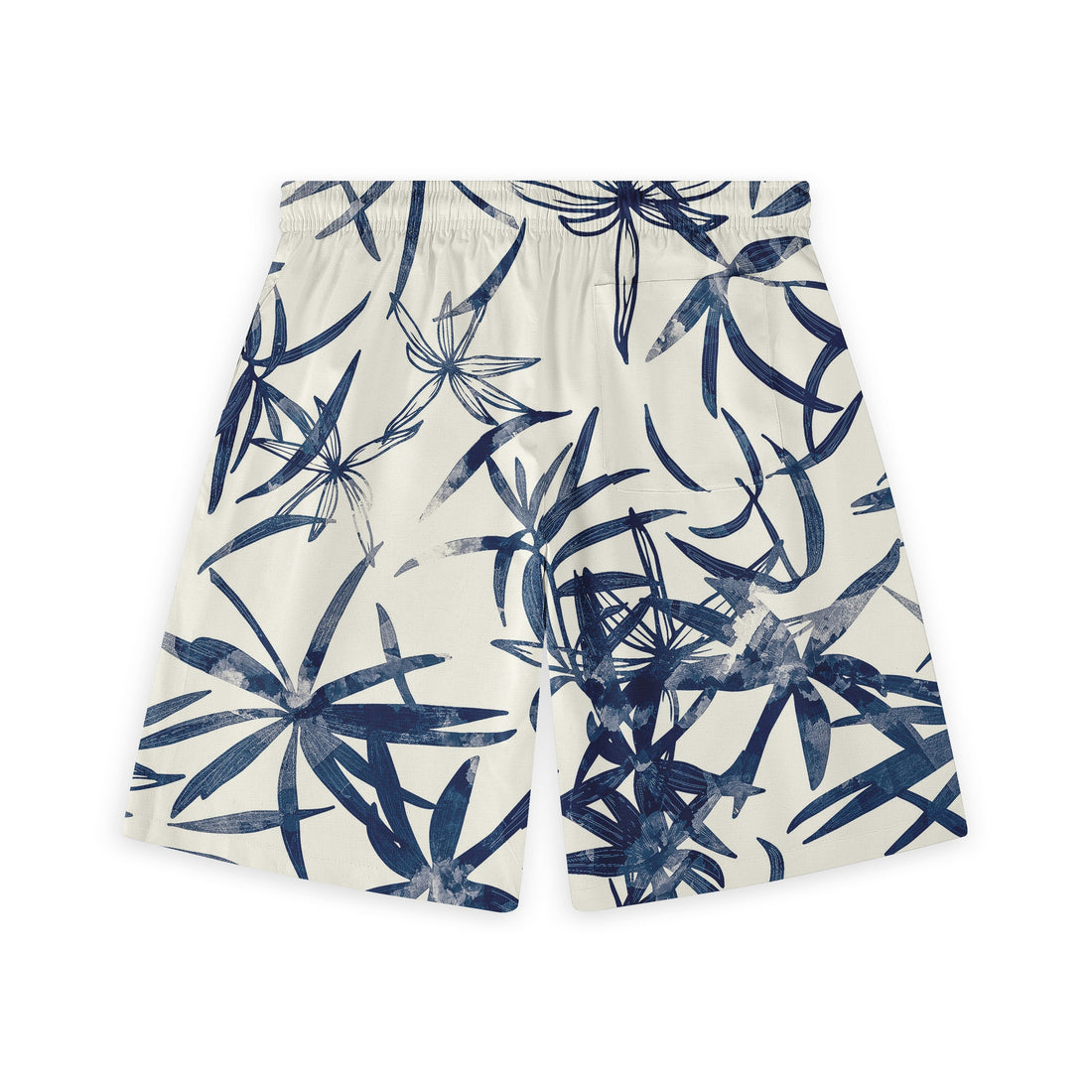 Cream shorts with navy blue tropical leaf print, elastic waistband.