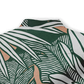 A Hawaiian shirt featuring green and white striped botanical patterns, exuding a fresh and natural style.