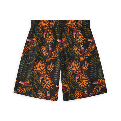 Dark shorts featuring a bold tropical pattern with orange leaves and colorful parrots, creating a vibrant and exotic look.