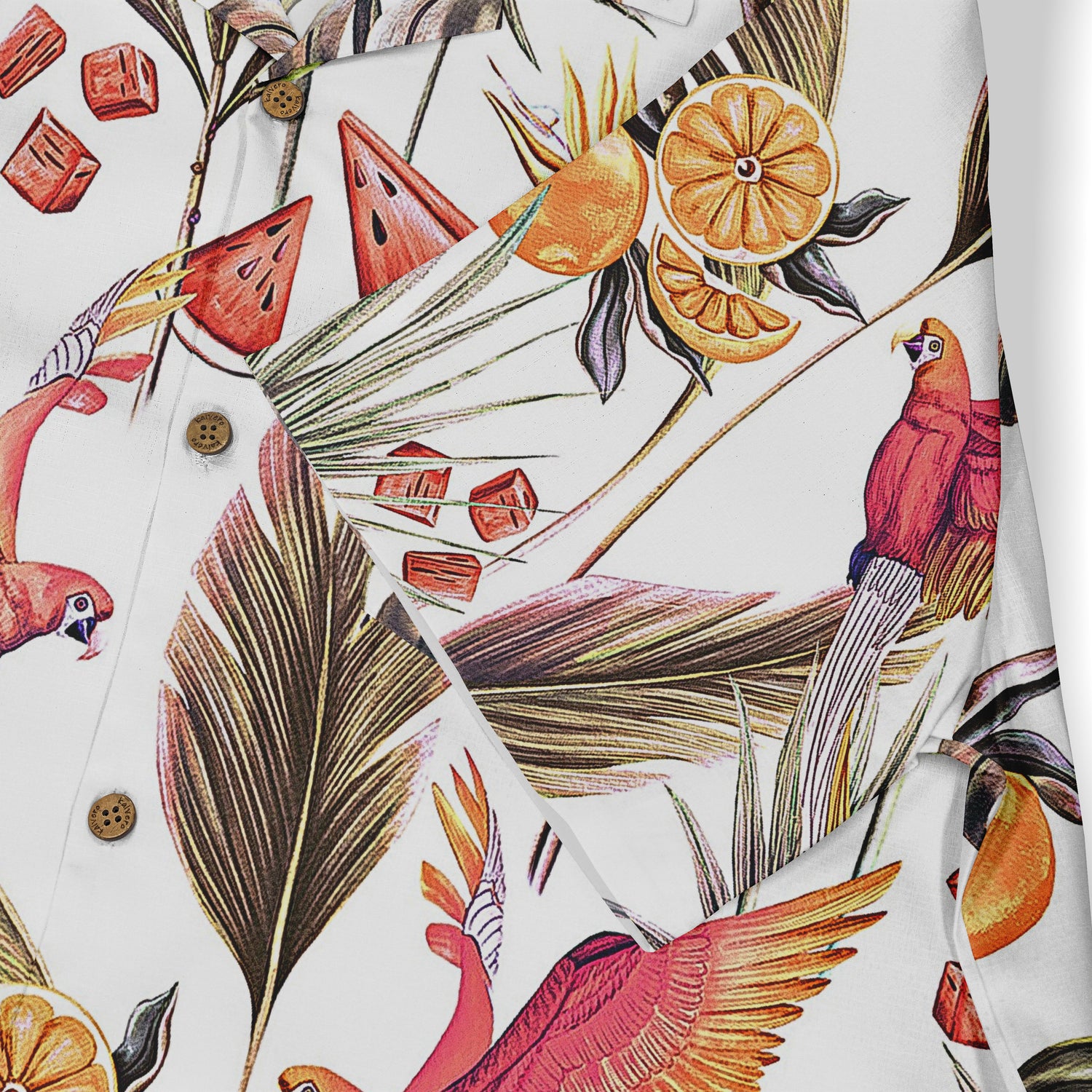 This close-up emphasizes the vibrant tropical pattern with elements like parrots, oranges, and leaves, making it a lively and summery design.