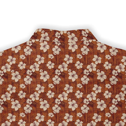 Brown shirt with white hibiscus flowers and geometric patterns.
