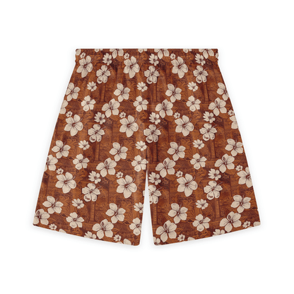 Brown shorts with white hibiscus floral pattern.