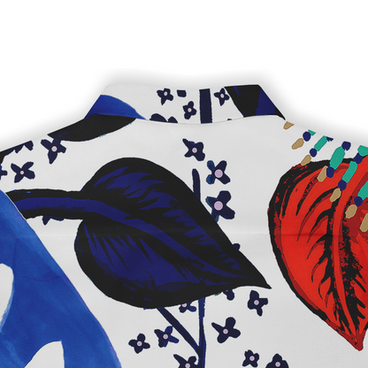 This is a close-up of the back of a shirt featuring a bold, abstract design with vibrant blue and red leaves, accented by small black floral elements. The pattern is set against a white background, creating a striking and dynamic visual effect.