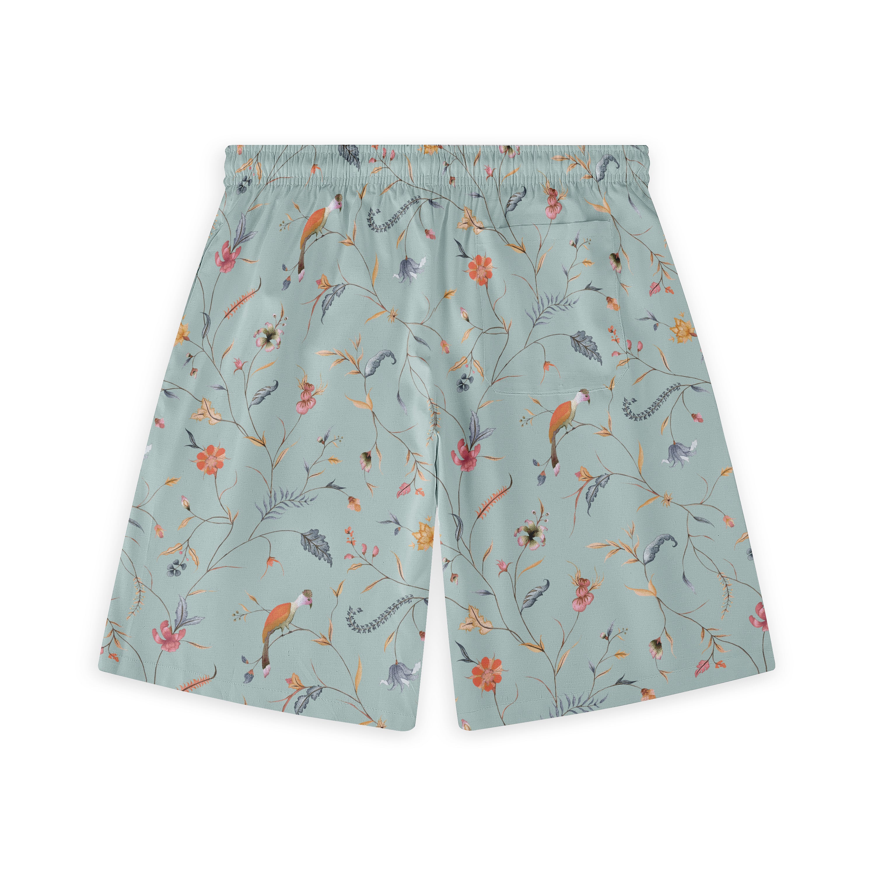 Light green shorts with a soft floral pattern, featuring delicate branches, leaves, and small birds in a variety of gentle colors.