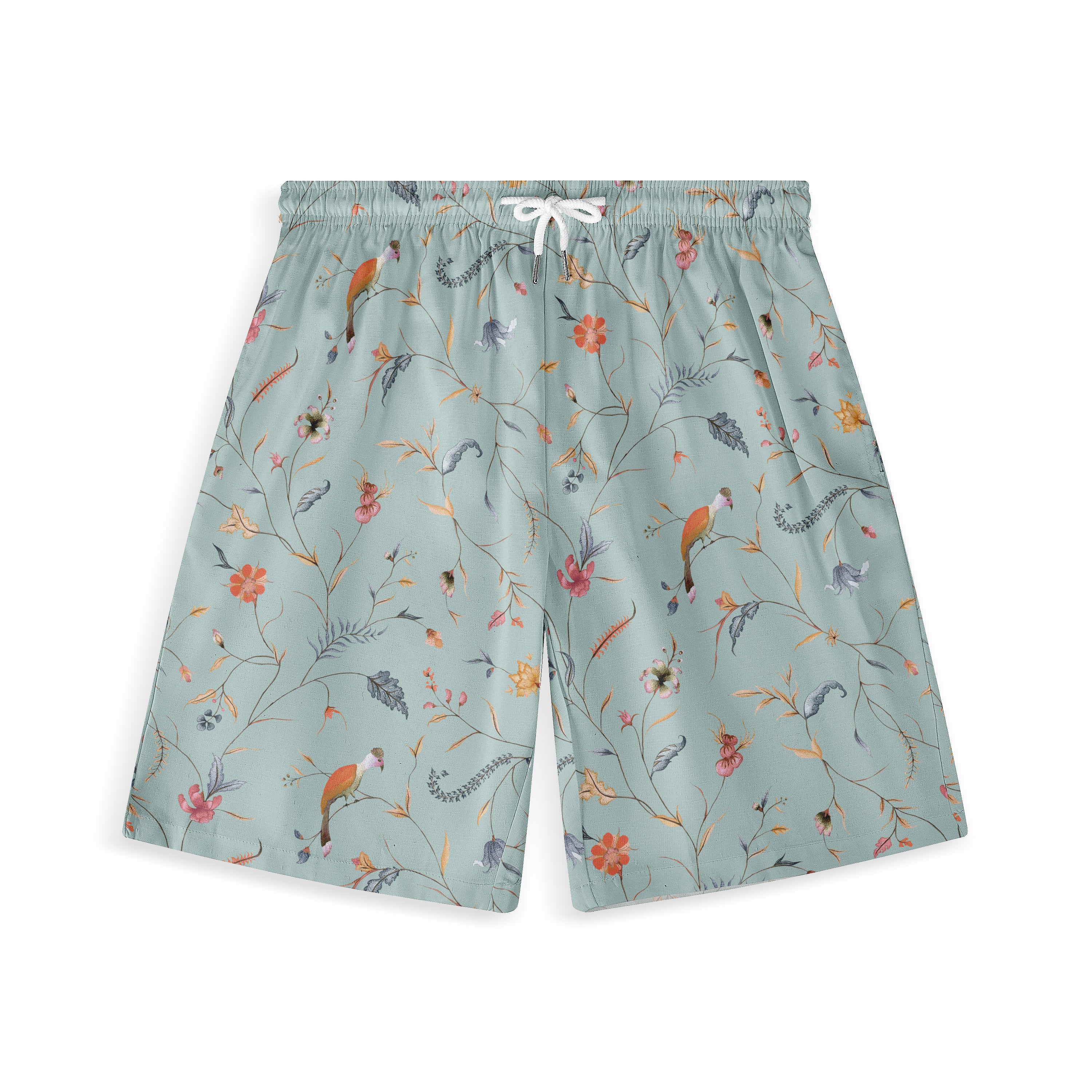 Light green shorts adorned with a delicate floral pattern, featuring small birds and leaves in various soft colors, offering a fresh, nature-inspired look.